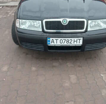 Черный Шкода Октавия, объемом двигателя 1.6 л и пробегом 250 тыс. км за 5700 $, фото 1 на Automoto.ua