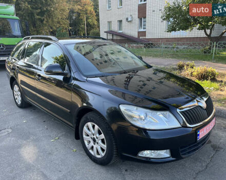 Черный Шкода Октавия, объемом двигателя 1.6 л и пробегом 221 тыс. км за 6900 $, фото 1 на Automoto.ua