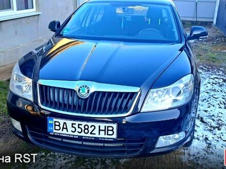 Черный Шкода Октавия, объемом двигателя 1.6 л и пробегом 219 тыс. км за 7700 $, фото 1 на Automoto.ua
