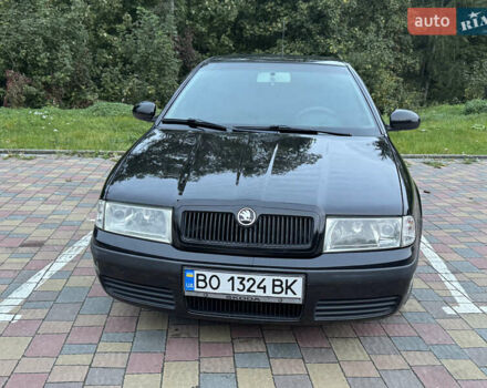 Черный Шкода Октавия, объемом двигателя 1.6 л и пробегом 225 тыс. км за 5650 $, фото 1 на Automoto.ua