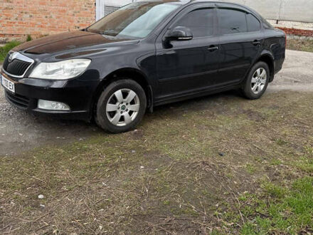 Черный Шкода Октавия, объемом двигателя 1.8 л и пробегом 215 тыс. км за 6900 $, фото 1 на Automoto.ua