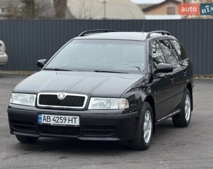 Черный Шкода Октавия, объемом двигателя 1.6 л и пробегом 201 тыс. км за 7199 $, фото 1 на Automoto.ua