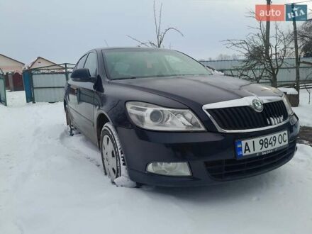 Черный Шкода Октавия, объемом двигателя 1.6 л и пробегом 274 тыс. км за 5887 $, фото 1 на Automoto.ua