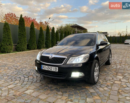 Шкода Октавия 2009 в Мукачеве на Automoto.ua Черный Шкода Октавия, объемом двигателя 1.6 л и пробегом 282 тыс. км за 7700 $, фото 1 на Automoto.ua
