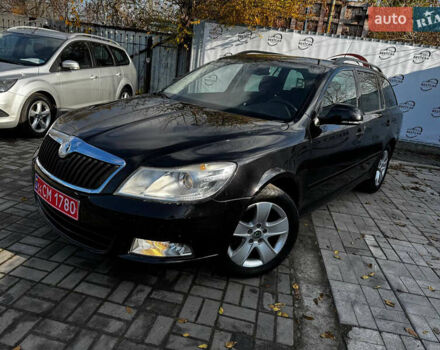 Черный Шкода Октавия, объемом двигателя 1.4 л и пробегом 177 тыс. км за 6900 $, фото 1 на Automoto.ua