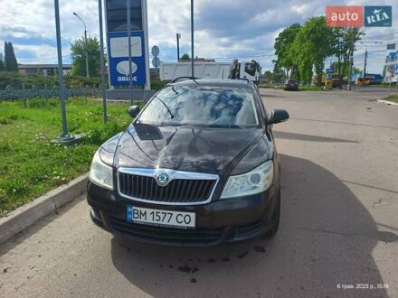 Чорний Шкода Октавія, об'ємом двигуна 1.2 л та пробігом 247 тис. км за 7200 $, фото 1 на Automoto.ua