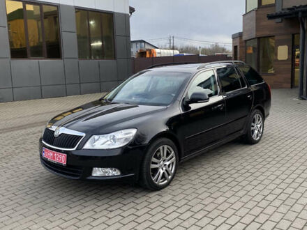 Черный Шкода Октавия, объемом двигателя 2 л и пробегом 241 тыс. км за 8800 $, фото 1 на Automoto.ua