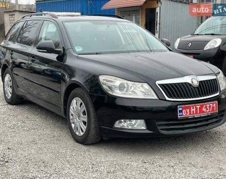 Черный Шкода Октавия, объемом двигателя 1.6 л и пробегом 176 тыс. км за 7550 $, фото 1 на Automoto.ua