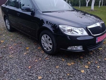 Черный Шкода Октавия, объемом двигателя 1.4 л и пробегом 165 тыс. км за 8250 $, фото 1 на Automoto.ua