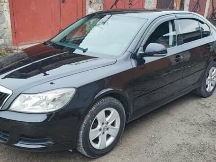 Черный Шкода Октавия, объемом двигателя 1.6 л и пробегом 270 тыс. км за 6999 $, фото 1 на Automoto.ua