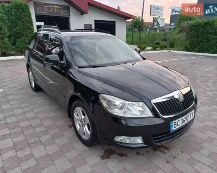 Шкода Октавія 2010 у Яворове на Automoto.ua Чорний Шкода Октавія, об'ємом двигуна 1.6 л та пробігом 303 тис. км за 8200 $, фото 1 на Automoto.ua