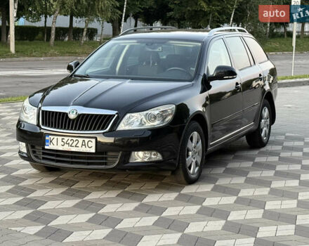 Черный Шкода Октавия, объемом двигателя 1.39 л и пробегом 227 тыс. км за 7550 $, фото 1 на Automoto.ua