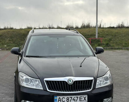 Черный Шкода Октавия, объемом двигателя 1.6 л и пробегом 182 тыс. км за 9300 $, фото 1 на Automoto.ua