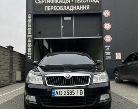 Черный Шкода Октавия, объемом двигателя 2 л и пробегом 320 тыс. км за 7800 $, фото 1 на Automoto.ua
