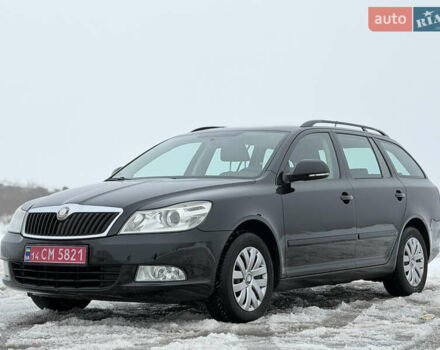 Черный Шкода Октавия, объемом двигателя 1.6 л и пробегом 201 тыс. км за 8599 $, фото 1 на Automoto.ua