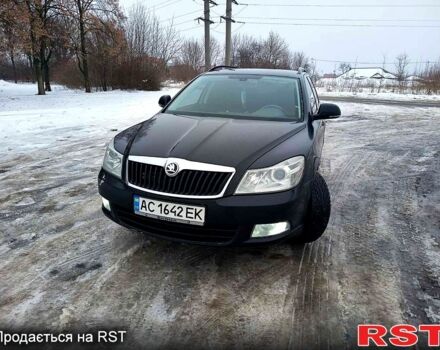Черный Шкода Октавия, объемом двигателя 2 л и пробегом 330 тыс. км за 8900 $, фото 1 на Automoto.ua