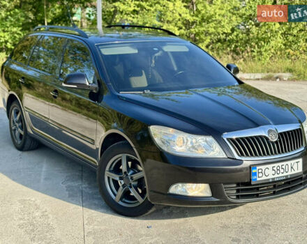 Черный Шкода Октавия, объемом двигателя 1.6 л и пробегом 220 тыс. км за 7650 $, фото 1 на Automoto.ua