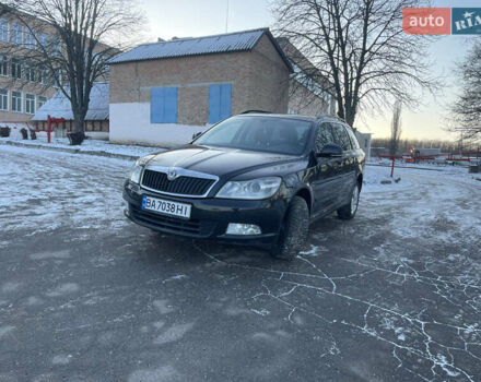 Черный Шкода Октавия, объемом двигателя 1.39 л и пробегом 220 тыс. км за 7900 $, фото 1 на Automoto.ua