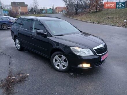 Черный Шкода Октавия, объемом двигателя 1.4 л и пробегом 201 тыс. км за 8699 $, фото 1 на Automoto.ua