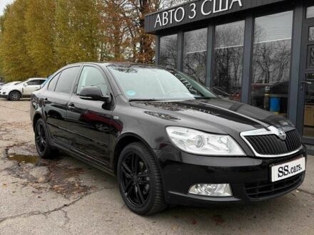 Черный Шкода Октавия, объемом двигателя 1.8 л и пробегом 165 тыс. км за 8000 $, фото 1 на Automoto.ua