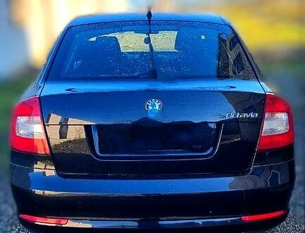 Чорний Шкода Октавія, об'ємом двигуна 1.2 л та пробігом 198 тис. км за 6500 $, фото 1 на Automoto.ua