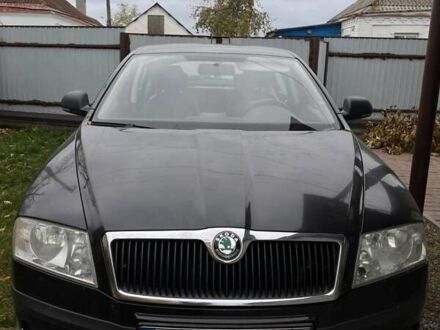 Черный Шкода Октавия, объемом двигателя 1.6 л и пробегом 204 тыс. км за 7800 $, фото 1 на Automoto.ua