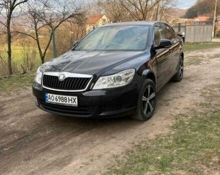 Черный Шкода Октавия, объемом двигателя 1.6 л и пробегом 300 тыс. км за 7500 $, фото 1 на Automoto.ua