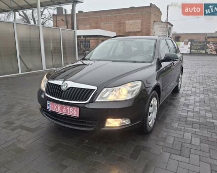 Чорний Шкода Октавія, об'ємом двигуна 1.6 л та пробігом 221 тис. км за 8600 $, фото 1 на Automoto.ua