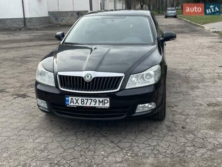 Черный Шкода Октавия, объемом двигателя 1.8 л и пробегом 210 тыс. км за 9600 $, фото 1 на Automoto.ua