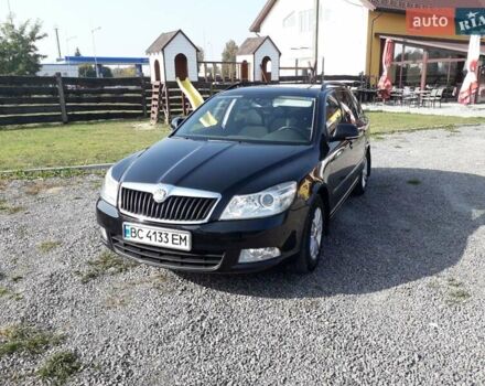 Черный Шкода Октавия, объемом двигателя 1.2 л и пробегом 200 тыс. км за 7999 $, фото 1 на Automoto.ua
