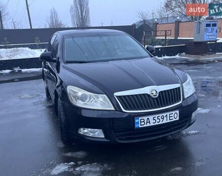 Черный Шкода Октавия, объемом двигателя 1.6 л и пробегом 209 тыс. км за 8600 $, фото 1 на Automoto.ua