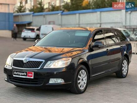Черный Шкода Октавия, объемом двигателя 1.6 л и пробегом 313 тыс. км за 9490 $, фото 1 на Automoto.ua