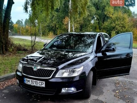 Черный Шкода Октавия, объемом двигателя 1.8 л и пробегом 135 тыс. км за 8000 $, фото 1 на Automoto.ua