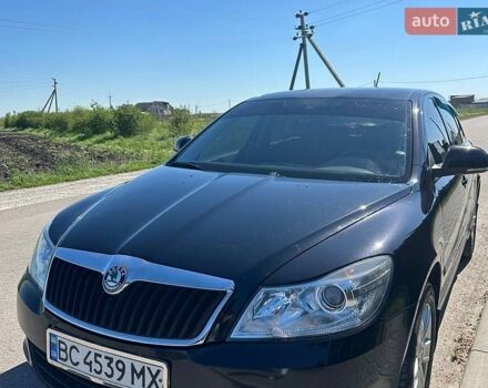 Черный Шкода Октавия, объемом двигателя 1.6 л и пробегом 247 тыс. км за 7500 $, фото 1 на Automoto.ua