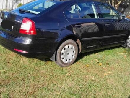 Черный Шкода Октавия, объемом двигателя 1.6 л и пробегом 240 тыс. км за 8000 $, фото 1 на Automoto.ua