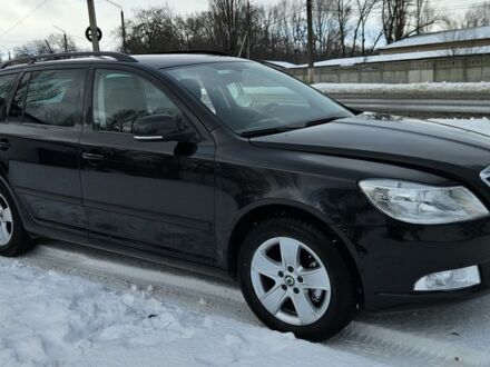 Черный Шкода Октавия, объемом двигателя 2 л и пробегом 153 тыс. км за 7800 $, фото 1 на Automoto.ua