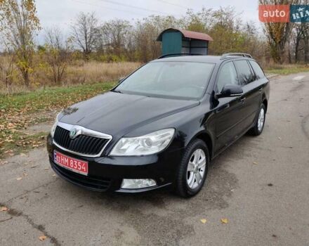 Черный Шкода Октавия, объемом двигателя 1.6 л и пробегом 228 тыс. км за 8600 $, фото 1 на Automoto.ua