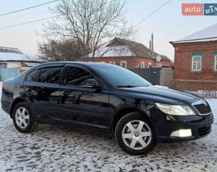 Черный Шкода Октавия, объемом двигателя 1.8 л и пробегом 168 тыс. км за 7299 $, фото 1 на Automoto.ua