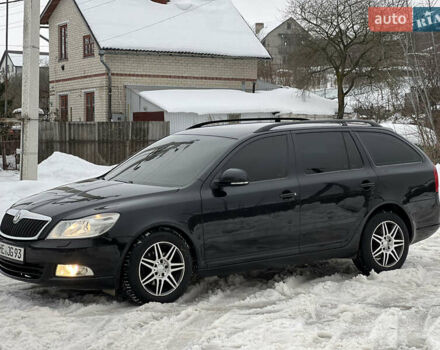 Черный Шкода Октавия, объемом двигателя 2 л и пробегом 316 тыс. км за 7200 $, фото 1 на Automoto.ua