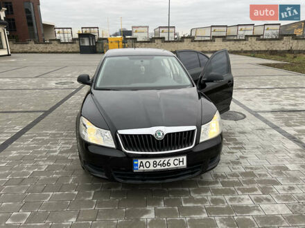 Черный Шкода Октавия, объемом двигателя 1.6 л и пробегом 195 тыс. км за 7500 $, фото 1 на Automoto.ua