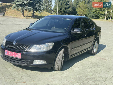 Черный Шкода Октавия, объемом двигателя 2 л и пробегом 231 тыс. км за 9950 $, фото 1 на Automoto.ua
