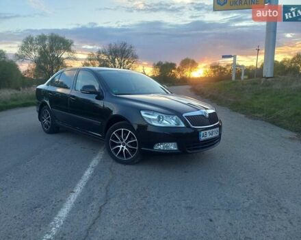 Черный Шкода Октавия, объемом двигателя 1.6 л и пробегом 186 тыс. км за 8599 $, фото 1 на Automoto.ua