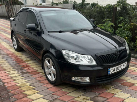 Чорний Шкода Октавія, об'ємом двигуна 1.8 л та пробігом 325 тис. км за 7300 $, фото 1 на Automoto.ua