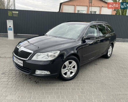 Чорний Шкода Октавія, об'ємом двигуна 1.39 л та пробігом 212 тис. км за 7999 $, фото 1 на Automoto.ua