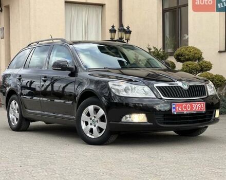 Черный Шкода Октавия, объемом двигателя 1.6 л и пробегом 221 тыс. км за 8999 $, фото 1 на Automoto.ua