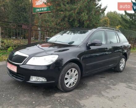 Черный Шкода Октавия, объемом двигателя 1.4 л и пробегом 215 тыс. км за 7299 $, фото 1 на Automoto.ua