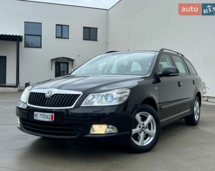 Чорний Шкода Октавія, об'ємом двигуна 2 л та пробігом 216 тис. км за 12350 $, фото 1 на Automoto.ua