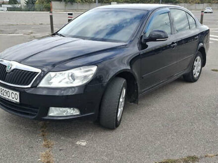 Черный Шкода Октавия, объемом двигателя 1.8 л и пробегом 236 тыс. км за 9000 $, фото 1 на Automoto.ua