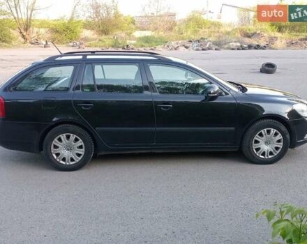 Черный Шкода Октавия, объемом двигателя 1.8 л и пробегом 196 тыс. км за 7200 $, фото 1 на Automoto.ua