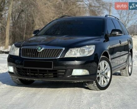Черный Шкода Октавия, объемом двигателя 2 л и пробегом 290 тыс. км за 9000 $, фото 1 на Automoto.ua